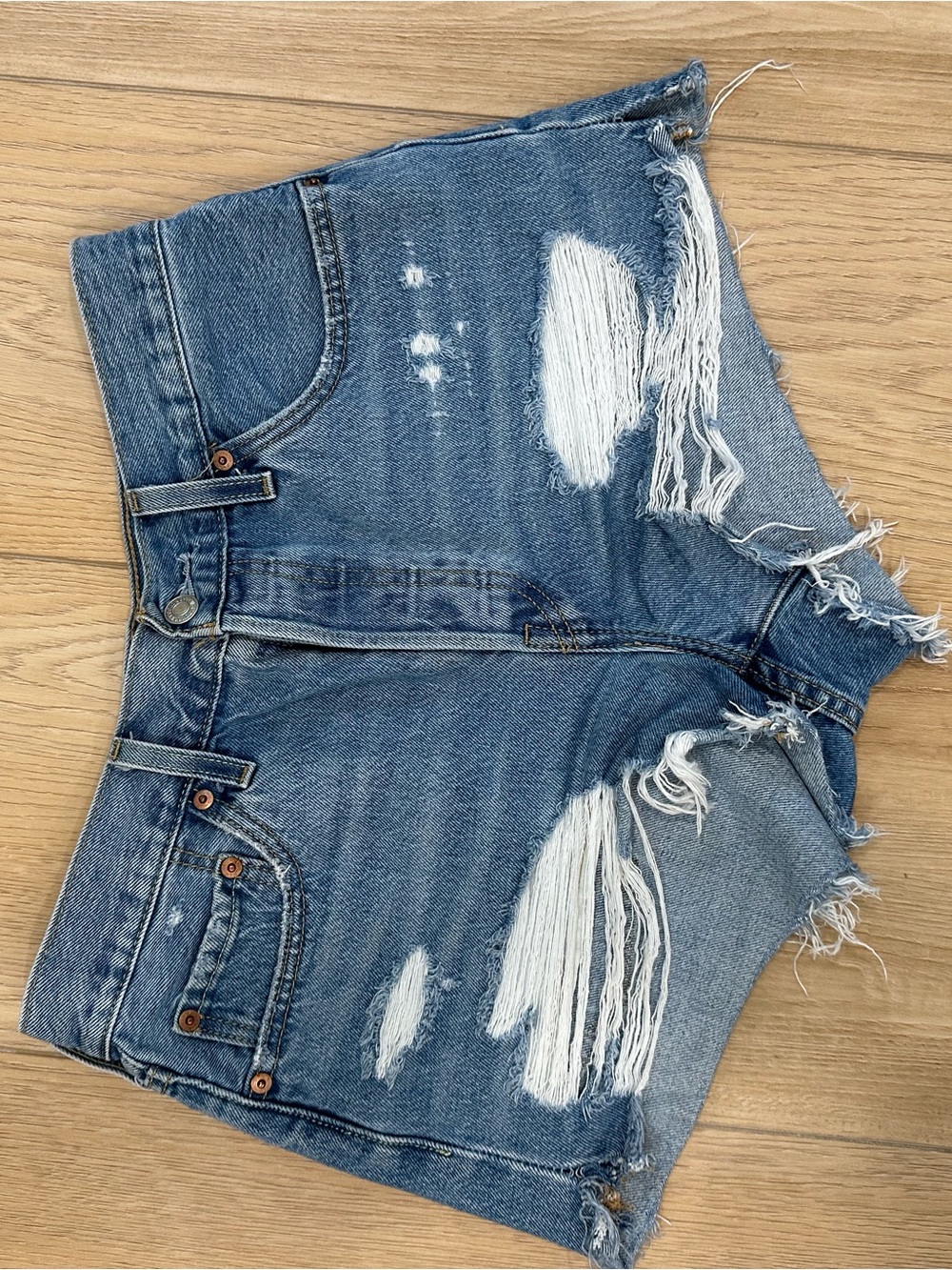 High-Rise Distressed Blue Denim Cutoff Shorts